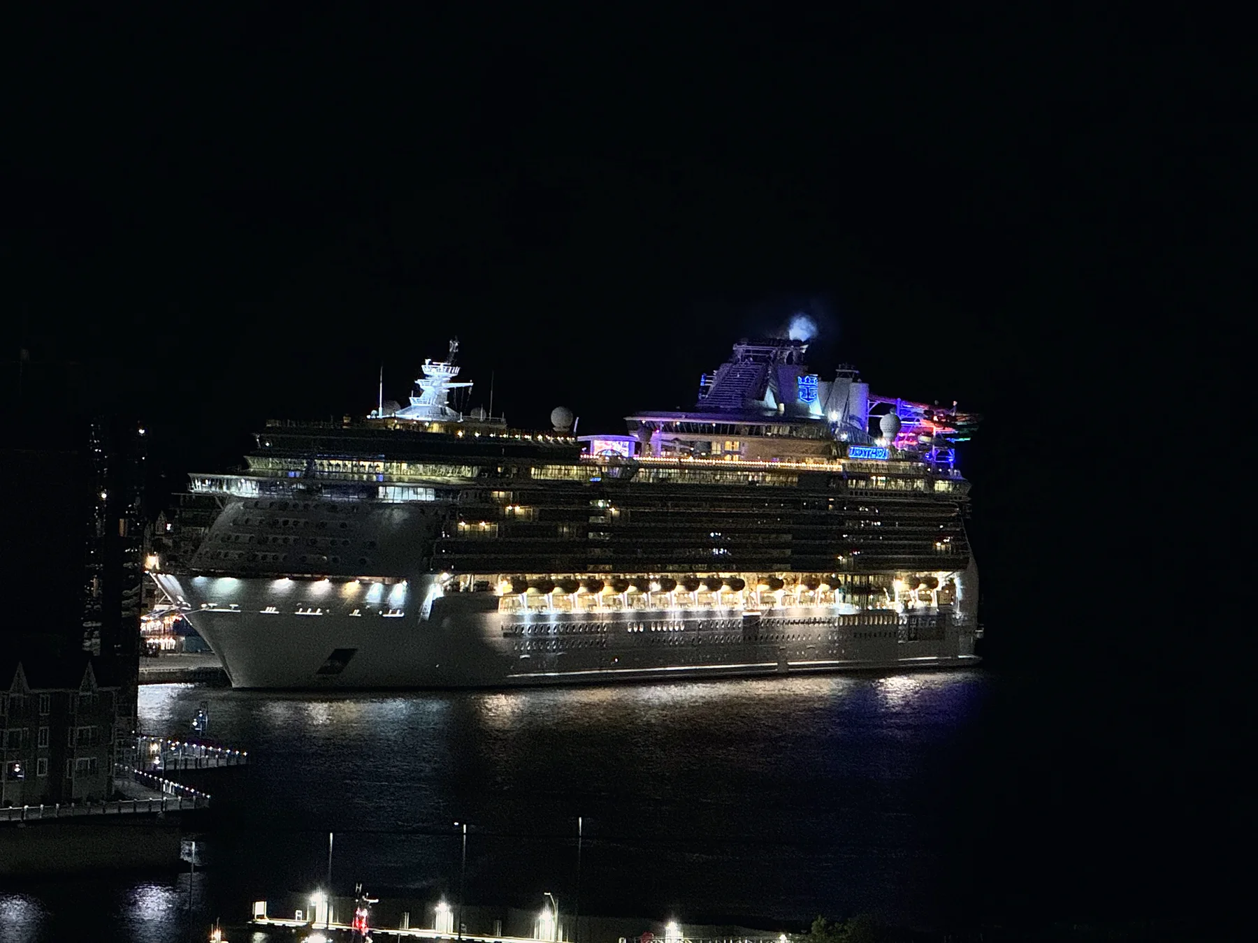 Cruise ship lit up at night in Saint John harbour
